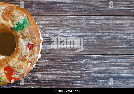 Roscon de reyes, kings' ring typical dessert eaten in Spain to celebrate Epiphany or Dia de Reyes Magos ,Three Wise Men Day. Spanish Christmas cake wi Stock Photo