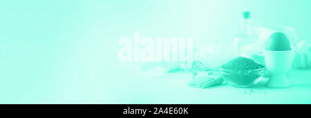 Knitted texture. Pattern fabric made of wool in mint color. Background, copy space. Biscay Green color of the year 2020 Stock Photo