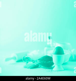 Knitted texture. Pattern fabric made of wool in mint color. Background, copy space. Biscay Green color of the year 2020 Stock Photo