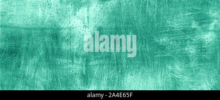Dark mint cement concrete background. Grunge texture, wallpaper. Copy space. Banner. Trendy green and turquoise color. Concrete texture, stone ground. Stock Photo
