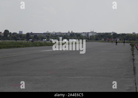 Abandoned airport Berlin Tempelhof. Now a place for people to relax, bike riding, skating, walking and much more. Stock Photo