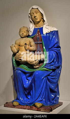 The sitting Virgin holding the Child standing on the right knee. by Santi BUGLIONI Florence 1459 - 1521, Italy, Italian. ( Partially glazed terracotta ) Stock Photo