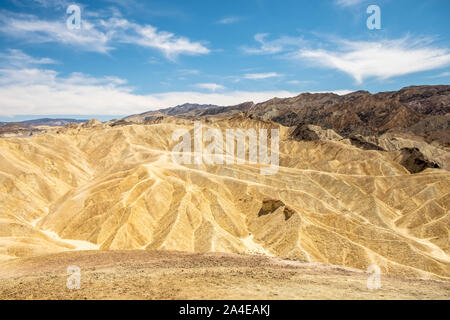 Eroding volcanic ash and silt hills, badlands, at Zabriskie Point, Death Valley National Park, California, USA Stock Photo