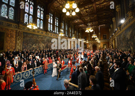 Queen Elizabeth II, accompanied by the Prince of Wales, leaving after delivering the Queen's Speech during the State Opening of Parliament in the House of Lords at the Palace of Westminster in London during the State Opening of Parliament in the House of Lords at the Palace of Westminster in London. Stock Photo