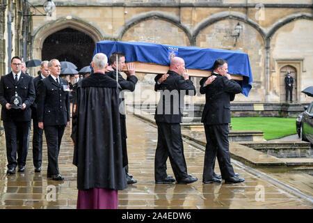 Pallbearers carry the coffin of PC Andrew Harper, the Thames Valley Police officer who died from multiple injuries after being dragged under a van while responding to reports of a burglary, as the cortege leaves the quadrangle at Christ Church Cathedral in St Aldate's, Oxford. Stock Photo