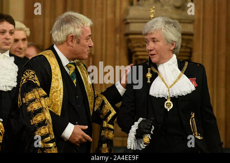 Speaker of the House of Commons John Bercow and Lady Usher of the Black Rod Sarah Clarke walk in the Central Lobby as they walk back to the House of Commons after the Queen's Speech during the State Opening of Parliament ceremony in London. Stock Photo