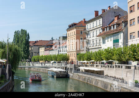 Sightseeing boat on Ljubljanica River, Old Town, Ljubljana, Slovenia Stock Photo