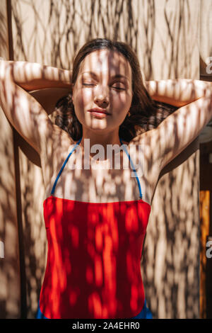 Beautiful young woman swimming under water in pool Stock Photo - Alamy
