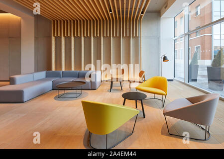 Furnishing in reception's waiting foyer area. Davidson House, Reading, United Kingdom. Architect: dn-a architecture, 2018. Stock Photo