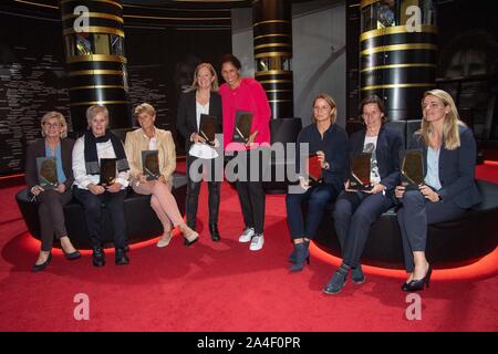 From left to right Silvia NEID (former football player and coach, GER), Tina THEUNE-MEYER (former coach, GER), Silke ROTTENBERG (former football player, TV women's football expert, GER), Renate LINGOR (former football player, GER), Inka GRINGS (former national player, GER), Bettina WIEGMANN (former football player, GER), Nia KUENZER (KÜNZER, ARD women's football expert, GER), full figure, horizontal format, recording the founding role of the women in the HALL OF FAME of the German Football on 12.10.2019 in Dortmund / Germany. | Usage worldwide Stock Photo