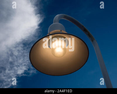 Lamp post against a beautiful sky at dusk, Florida, USA Stock Photo