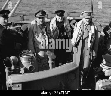 Churchill visiting the invasion beaches shortly after D-day.On his right Field Marshal Alan Brooke on left: Field Marshall Jan Smuts. 12th June 1944 Stock Photo