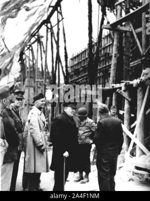 Winston Churchill visiting a V1 Rocket launch site near Cherbourg which had been put out of action by American forces.  August 1944 Stock Photo