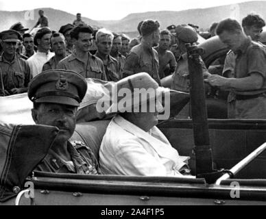 Winston Churchill visiting British troops in Italy with Field Marshal Alexander. August 1944 Stock Photo