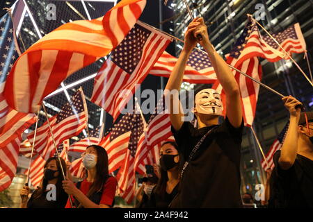 Hong Kong. 14th Oct, 2019. More than 130,000 protesters gathered for a peaceful rally in Central District, Hong Kong. Calling on the US to pass the Hong Kong Human Rights and Democracy Act of 2019 that would sanction officials who undermine people's rights in Hong Kong. Credit: David Coulson/Alamy Live News Stock Photo