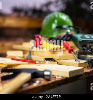 Carpenter's square, carpentry tools on a work table. Construction industry, housework do it yourself. Stock photography. Stock Photo