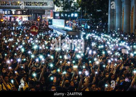 Hong Kong. 14th Oct, 2019. Thousands of protesters attend Hong Kong Human Rights and Democracy Act Rally at Chater Garden in Central District Hong Kong. This rally was proposed to US lawmakers that they should pass the act that would help the Hong Kong democracy. ItÃs aimed at putting pressure on Beijing to uphold its promise to preserve Hong KongÃs autonomy. Credit: Keith Tsuji/ZUMA Wire/Alamy Live News Stock Photo