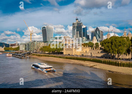Cityscape of the city of London with a ferry and tower of london Stock Photo