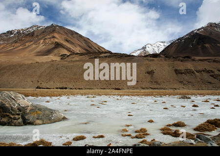 View landscape with Himalayas mountains and between Diskit - Turtok Highway and Pangong lake road go to Pangong Tso high grassland lake while winter s Stock Photo