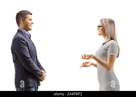 Man and woman standing and having a conversation isolated on white background Stock Photo