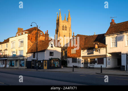 Tenterden High Street with St. Mildred's Church lit at sunrise, Kent. Stock Photo