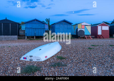 Traditional wooden beach huts on the North Kent coast at Whitstable. Stock Photo