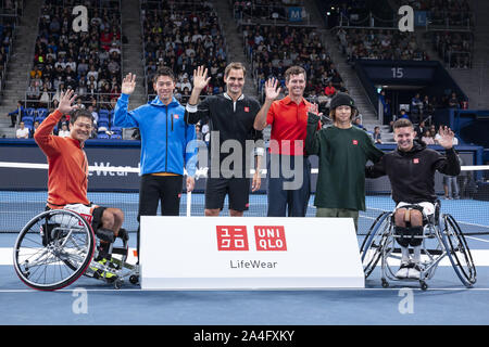 Tokyo, Japan. 14th Oct, 2019. (L to R) Tennis players Shingo Kunieda, Kei Nishikori, Roger Federer, Australian professional golfer Adam Scott, Japanese snowboarder Ayumu Hirano and Gordon Reid, pose for the cameras during the opening ceremony for the UNIQLO Life Wear Day Tokyo charity event at Ariake Coliseum. Professional tennis player Roger Federer who is UNIQLO Global Ambassador took part in a charity event in Tokyo. Federer announced his plans to compete at the Tokyo 2020 Olympics Games. Credit: Rodrigo Reyes Marin/ZUMA Wire/Alamy Live News Stock Photo