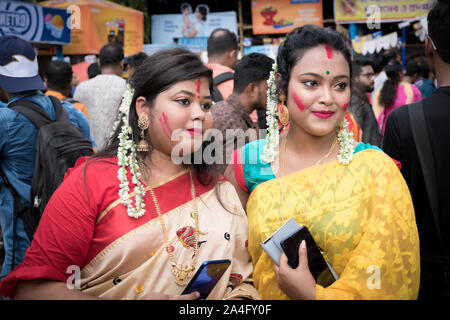 Kolkata, India – 8th October 2019; Women participate in Sindur Khela at a puja pandal on the last day of Durga puja at Baghbazar Sarbojanin in Kolkata Stock Photo