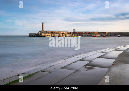 Margate Harbour Arm and seawall steps on the seafront. The Isle of Thanet, Kent. Stock Photo