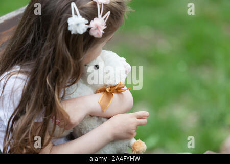A lovely little girl having quality time in nature. Stock Photo