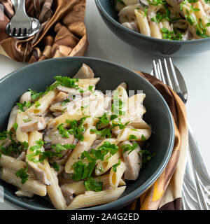 Cooked cream pasta with porcini mushrooms (Boletus edible) Stock Photo