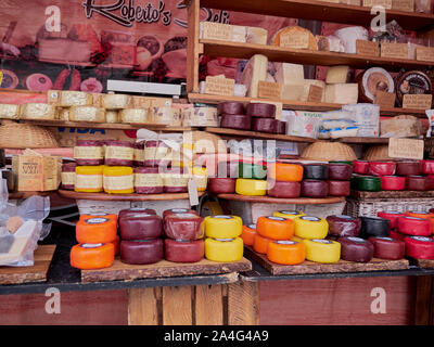 Cambridge, UK - October 9, 2019: Cambridge market square. Market stall with various cheeses Stock Photo