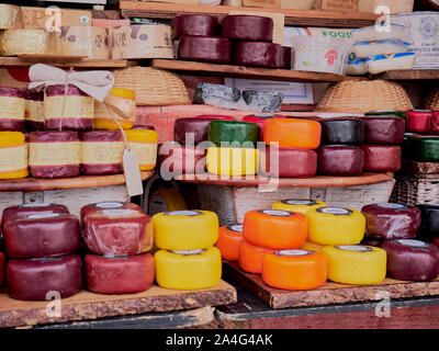 Cambridge, UK - October 9, 2019: Cambridge market square. Market stall with various cheeses Stock Photo