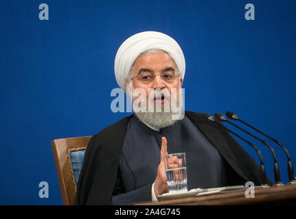 Tehran, Iran. 14th Oct, 2019. Iranian President Hassan Rouhani speaks at a press conference in Tehran, Iran, on Oct. 14, 2019. Iranian President Hassan Rouhani said on Monday that his country does not endorse Turkey's approach to the current issues in northern Syria. Credit: Ahmad Halabisaz/Xinhua/Alamy Live News Stock Photo