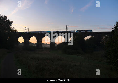 Sankey Viaduct Earlestown, Cheshire the first public Transpennine Express Nova 3 train with a class 68 locomotive running from Manchester to Liverpool Stock Photo