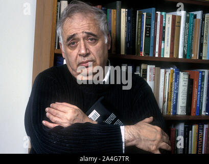 Professor Harold Bloom in his New York apartment. He answered questions from an interviewer resting on a day bed. Professor Harold Bloom answers questions during an interview in his New York apartment, May 12,1990. Harold Bloom, a prodigious literary critic who championed and defended the Western canon, published abundantly influential books that appeared not only on college syllabuses but also — unusual for an academic — on best-seller lists. Professor Bloom died on Monday October 14, 2019, at a hospital in New Haven. He was 89. Stock Photo