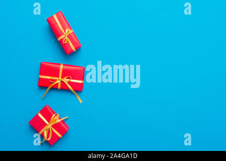 Christmas Gift Boxes Placed On Blue Background Stock Photo