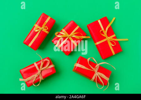 Christmas Gift Boxes Placed On Green Background Stock Photo