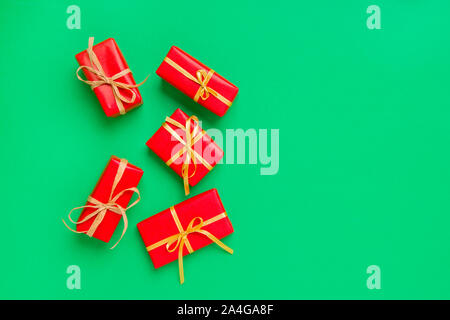 Christmas Gift Boxes Placed On Green Background Stock Photo