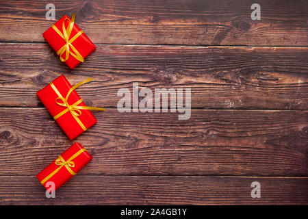 Christmas Gift Boxes Placed On Wooden Planks Stock Photo