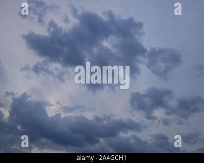 Dramatic gray and bluish cloudscape before storm in September Stock Photo