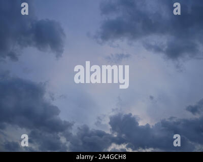 Grey and bluish dramatic cloudscape before storm in September Stock Photo