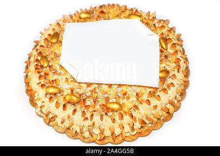 Top view on birthday cake decorated on white background and copy space tag. English soup cake: a traditional Italian dessert made with Italian sponge Stock Photo