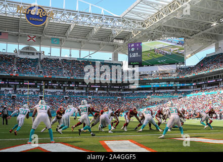 Miami Gardens, Florida, USA. 13th Oct, 2019. The Miami Dolphins flag is  displayed on the field after scoring a touchdown against the Washington  Redskins during an NFL football game at the Hard