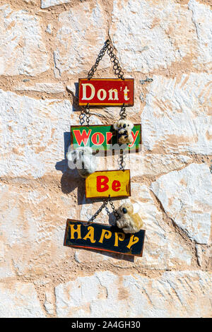 Sign at Viva Kas restaurant saying 'Don't worry, be happy' in Kas, Turkish Riviera, Turkey Stock Photo