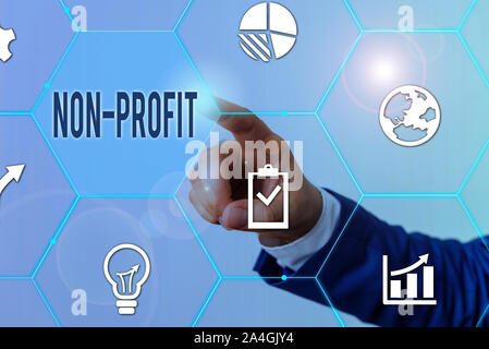 Conceptual hand writing showing Non Profit. Concept meaning type of organization that does not earn profits for its owners Male human wear formal suit Stock Photo