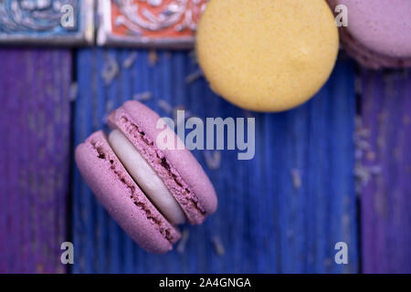 Colorful French Macarons made With Natural Colors and Ingredients: Matcha, Lavender, Coffee, Chocolate Stock Photo
