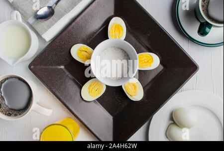 Boiled eggs from a chicken, cooked with their shells unbroken, immersion in boiling water Stock Photo