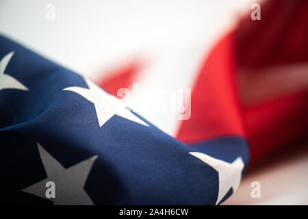 Closeup of American flag on plain background macro Stock Photo