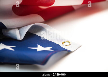 Closeup of American flag on plain background macro Stock Photo